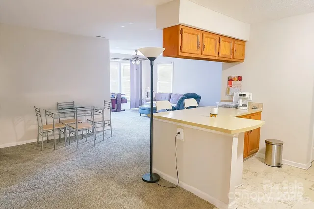 a utility room with sink dryer and washer