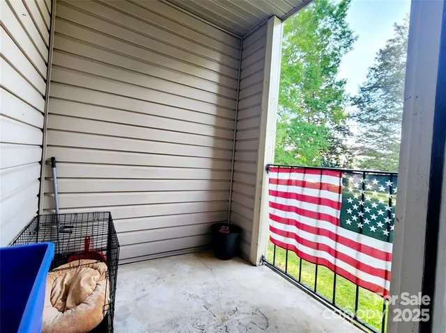 a stairs and a bench in front of a building