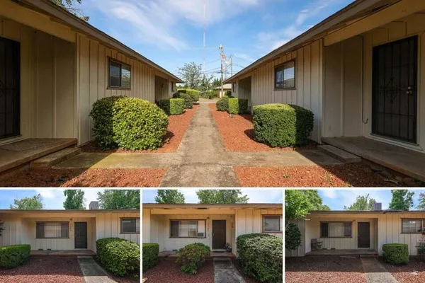 a view of a yard in front of a house