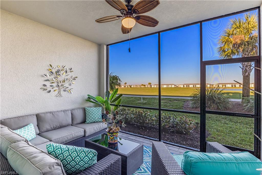 43031 Greenway Boulevard, Unit 1028 Babcock Ranch, FL 33982 - Photo 5 of 15 a living room with furniture with a large window