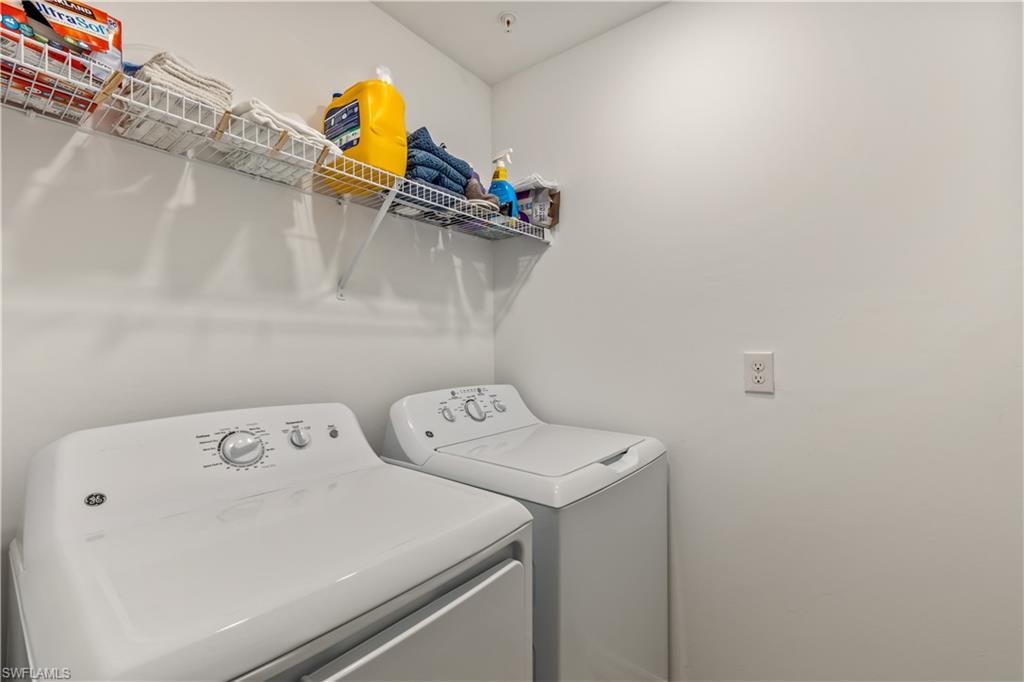 43031 Greenway Boulevard, Unit 1028 Babcock Ranch, FL 33982 - Photo 9 of 15 a utility room with dryer and washer