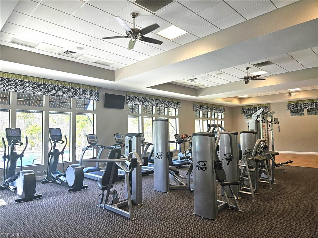 4686 Abaca Circle Naples, FL 34119 - Photo 42 of 47 a view of a room with gym equipment
