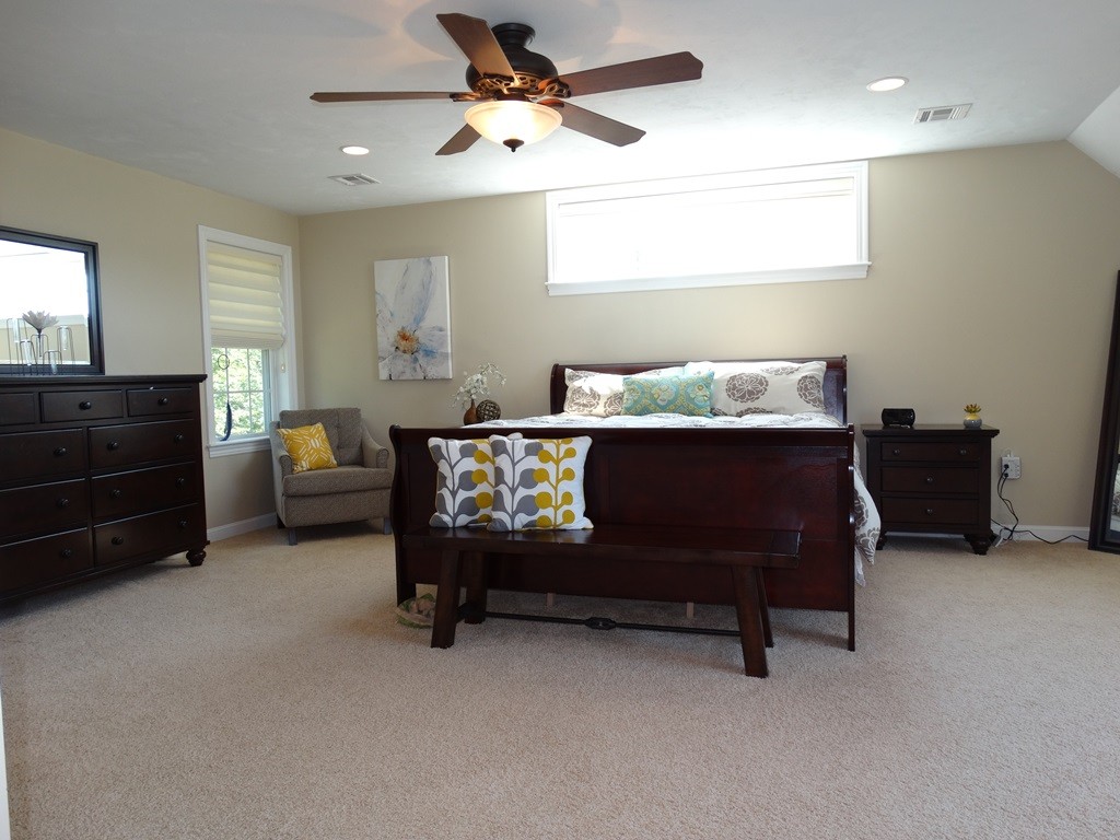 39 Ridgewood Street Ashland, MA 01721 - Photo 20 of 30 a living room with furniture and a lamp