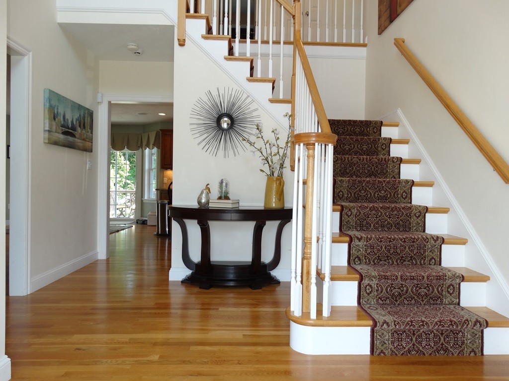 39 Ridgewood Street Ashland, MA 01721 - Photo 2 of 30 a view of entryway and hall with wooden floor