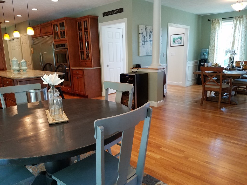 39 Ridgewood Street Ashland, MA 01721 - Photo 9 of 30 a living room with furniture and wooden floor