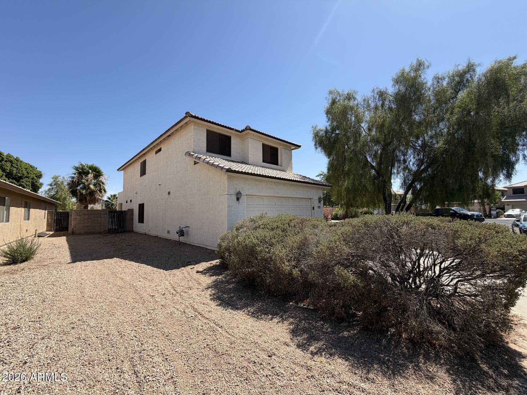 10807 West Monte Vista Road Avondale, AZ 85392 - Photo 3 of 33 a house view with a outdoor space