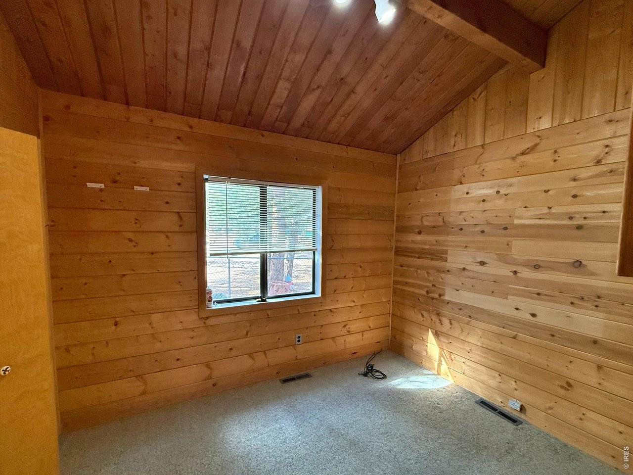 6687 Overland Road Ward, CO 80481 - Photo 16 of 35 Lower bedroom