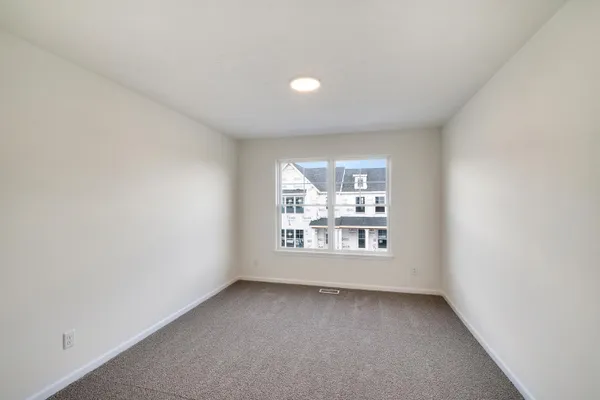 an empty room with a window