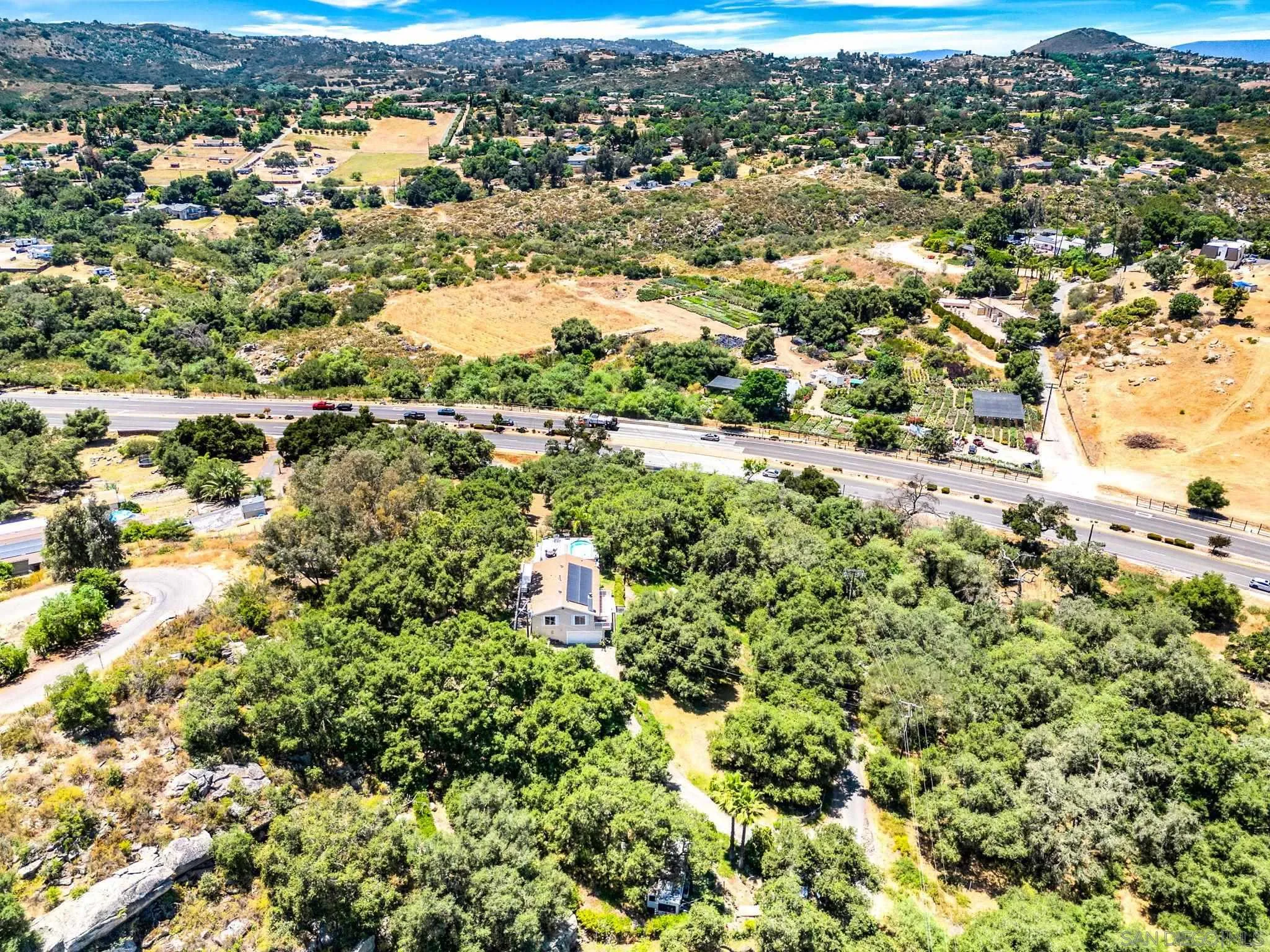 28517 Valley Center Road Valley Center, CA 92082 - Photo 54 of 55 an aerial view of a houses with a lake