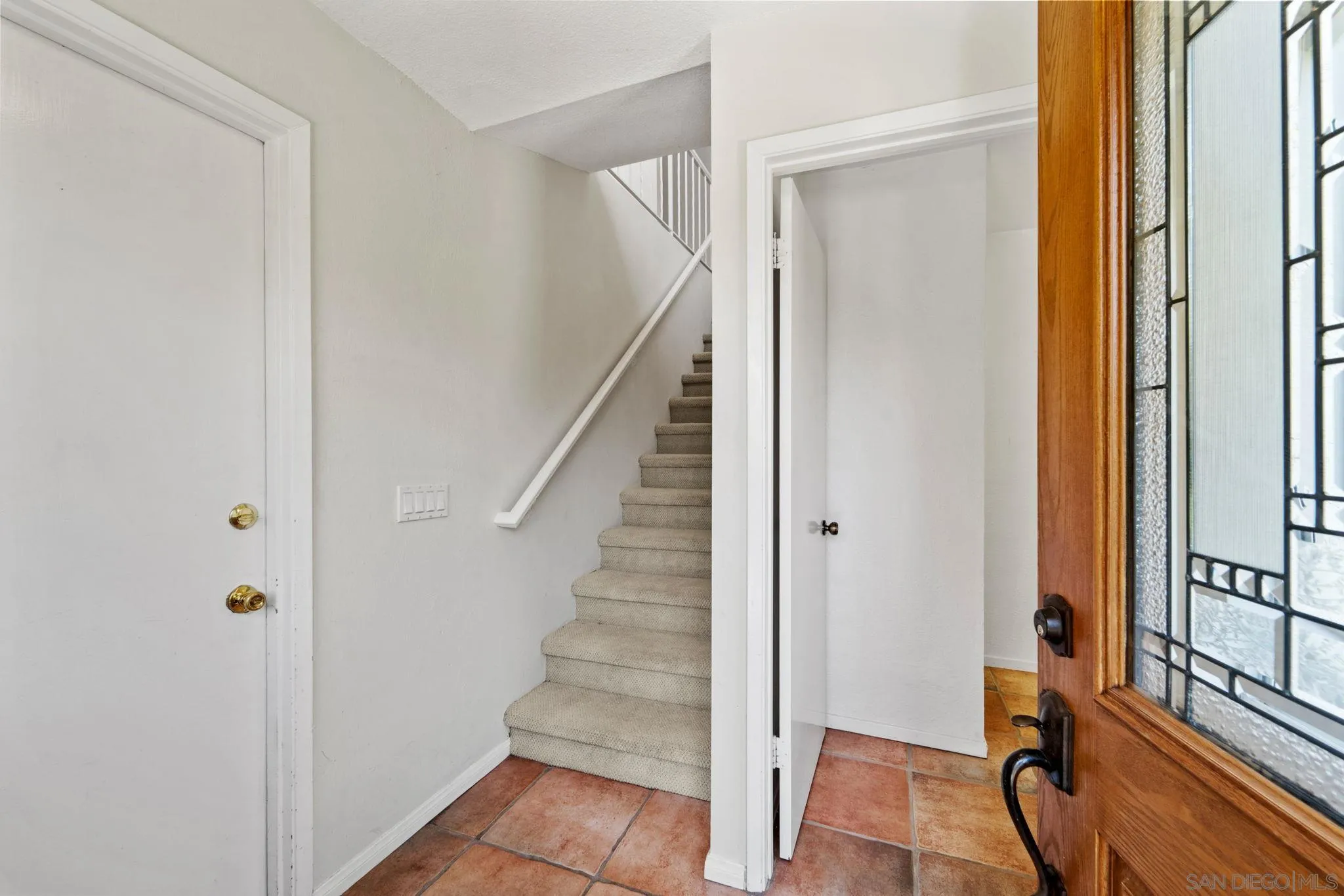 28517 Valley Center Road Valley Center, CA 92082 - Photo 6 of 55 a view of a hallway with wooden floor and entryway