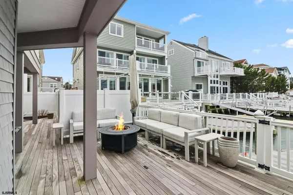 a front view of a house with a deck