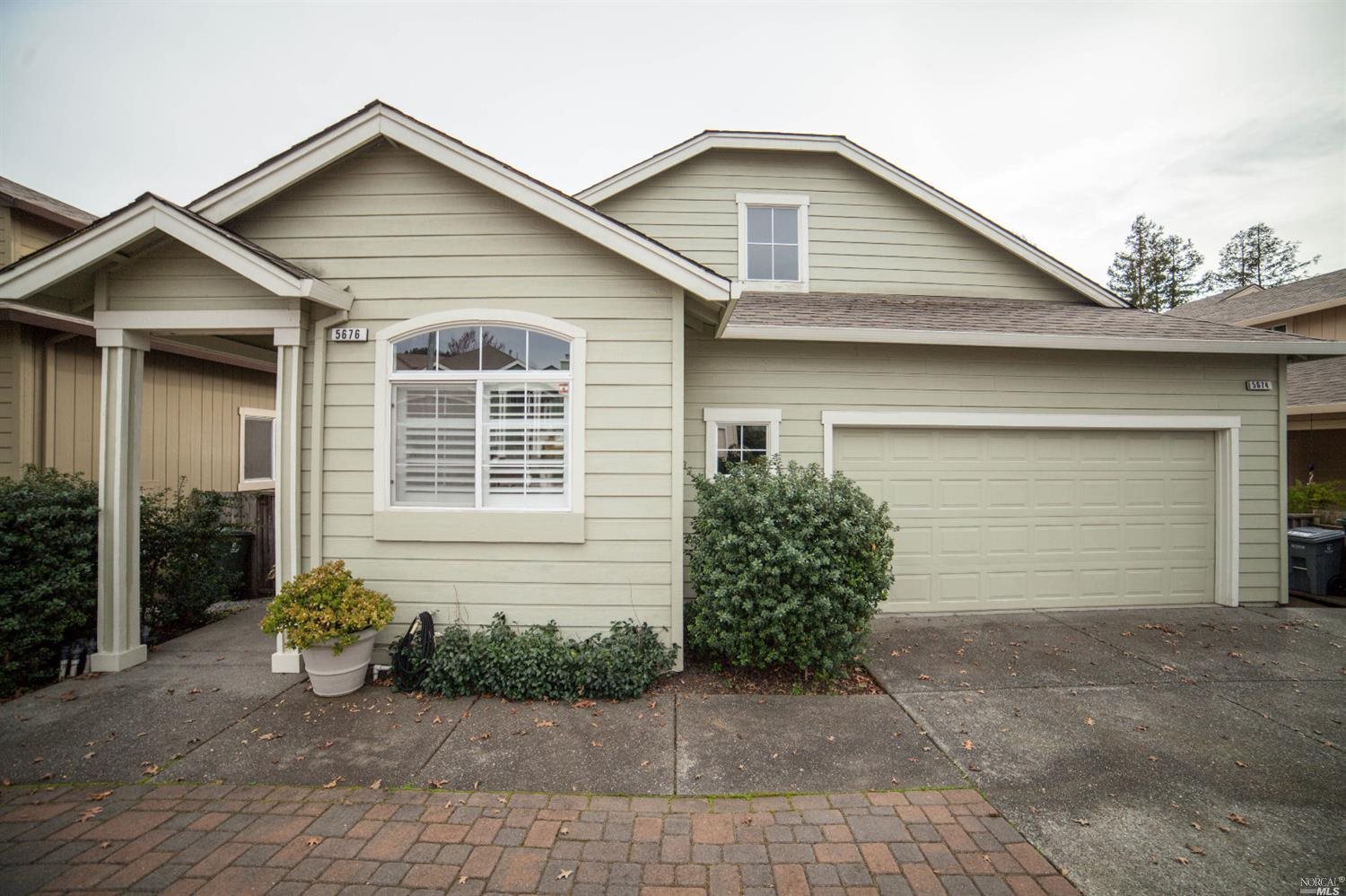 5676 Raters Drive Santa Rosa, CA 95409 - Photo 1 of 1 a front view of a house with garden