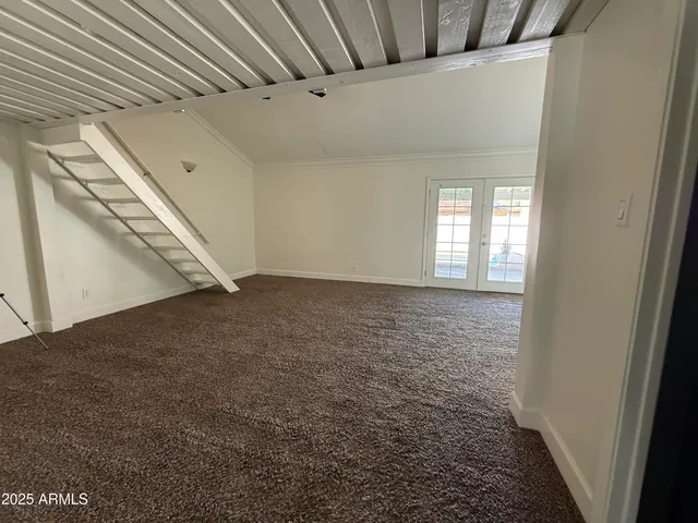 a view of a hallway with a large window