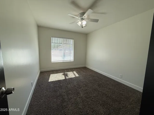 a view of a livingroom with a chandelier