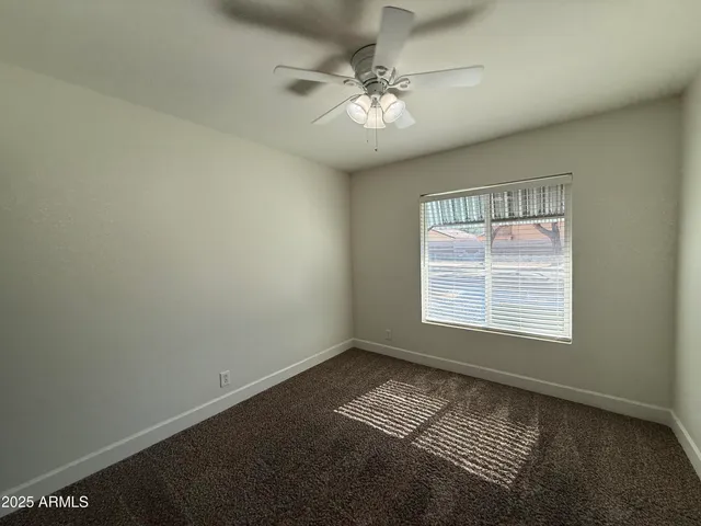 a view of closet area with empty racks