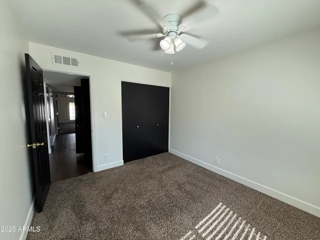 a room with furniture and a flat screen tv