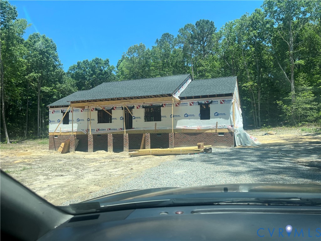 17531 Cabin Point Road Carson, VA 23830 - Photo 1 of 1 New construction residence featuring a dark shingl