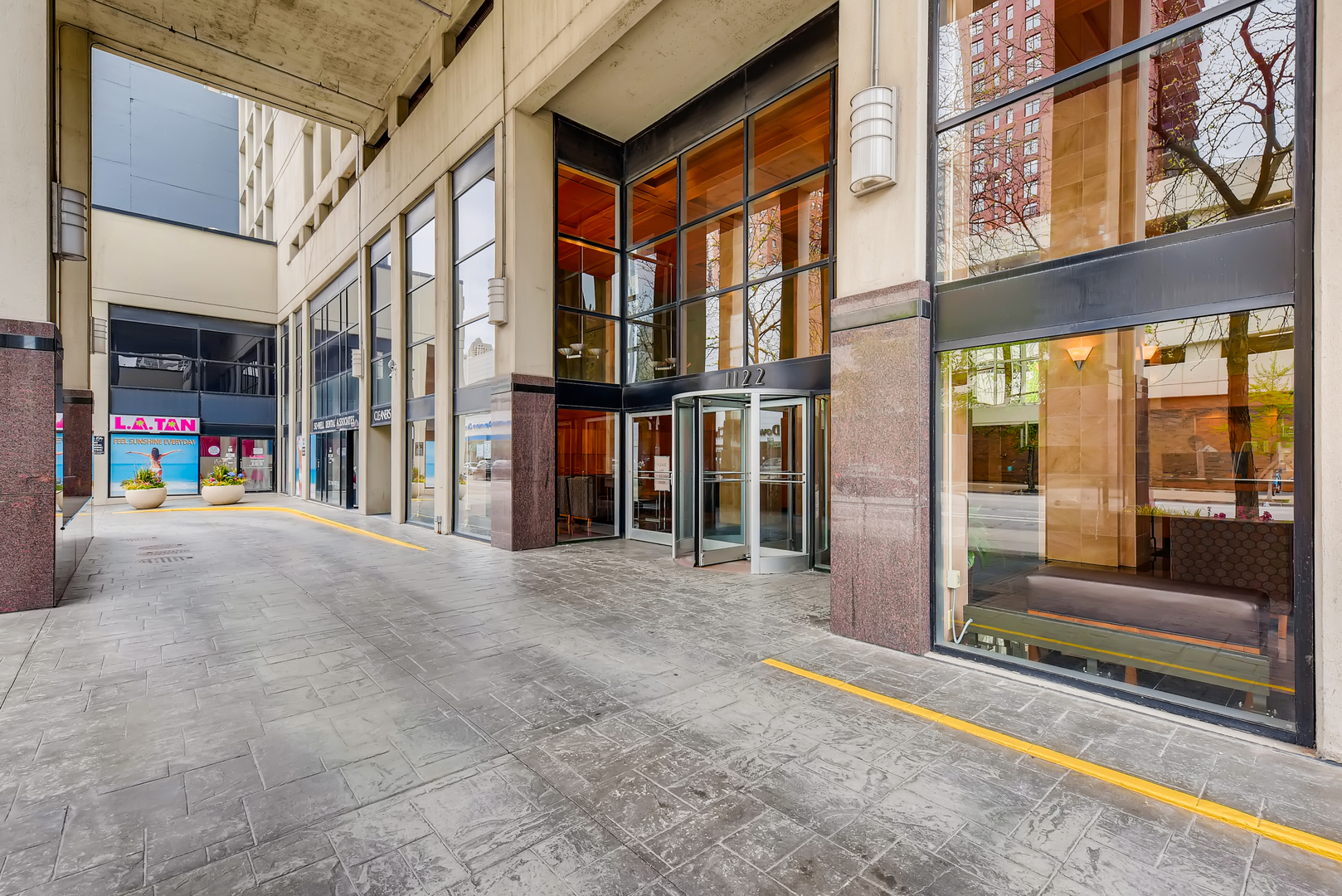 1122 North Clark Street, Unit 2207 Chicago, IL 60610 - Photo 3 of 14 a view of a building along the street