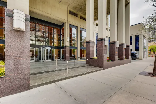 a view of a building with a glass door