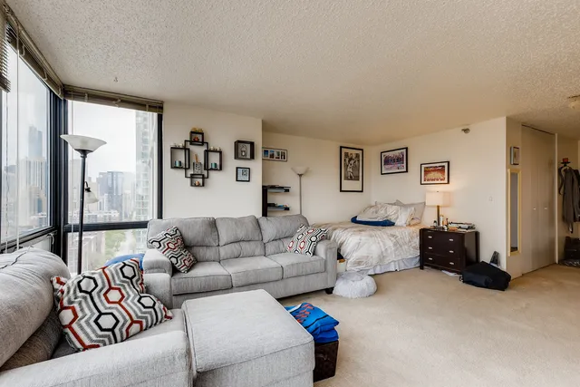 a living room with furniture and a couch