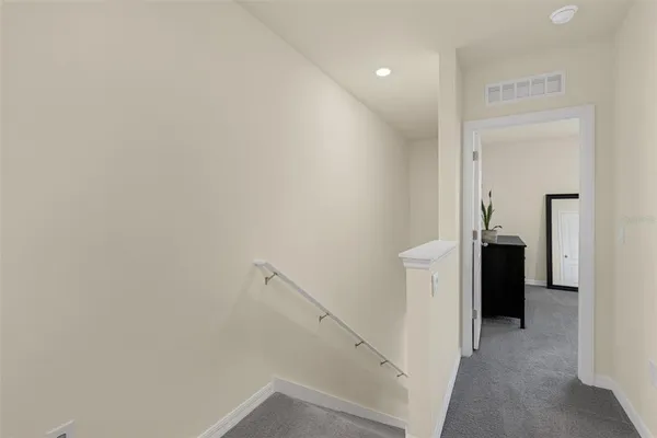a view of hallway with stairs