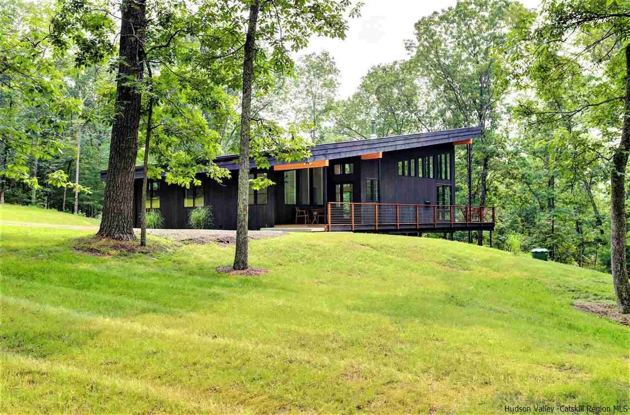 10 Hidden Mountain Stone Ridge, NY 12484 - Photo 1 of 35 a house with swimming pool in front of it