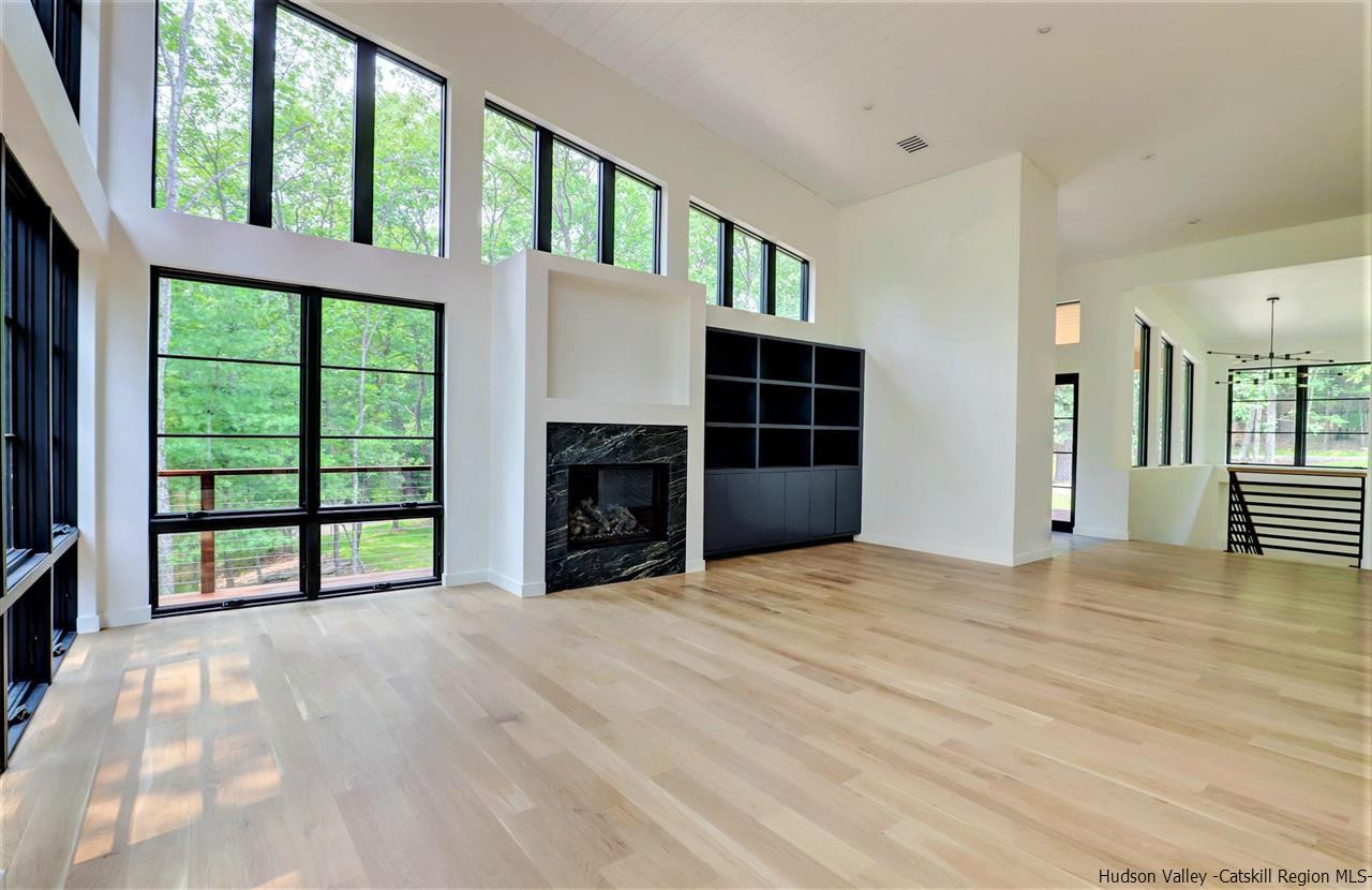 10 Hidden Mountain Stone Ridge, NY 12484 - Photo 14 of 35 a view of an empty room with a window and a kitchen
