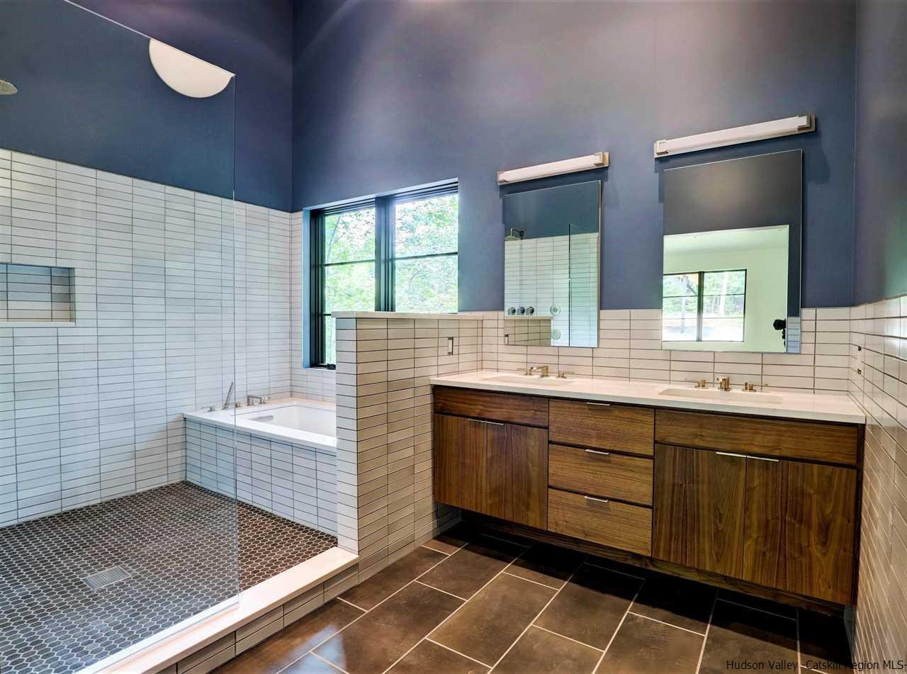10 Hidden Mountain Stone Ridge, NY 12484 - Photo 16 of 35 a bathroom with a sink double vanity and a mirror