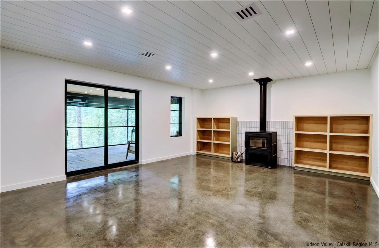 10 Hidden Mountain Stone Ridge, NY 12484 - Photo 20 of 35 an empty room with furniture and windows