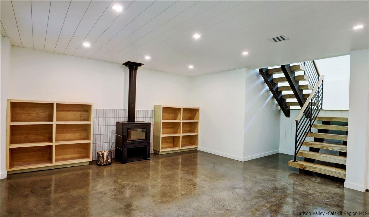 10 Hidden Mountain Stone Ridge, NY 12484 - Photo 21 of 35 a view of an empty room with a fireplace
