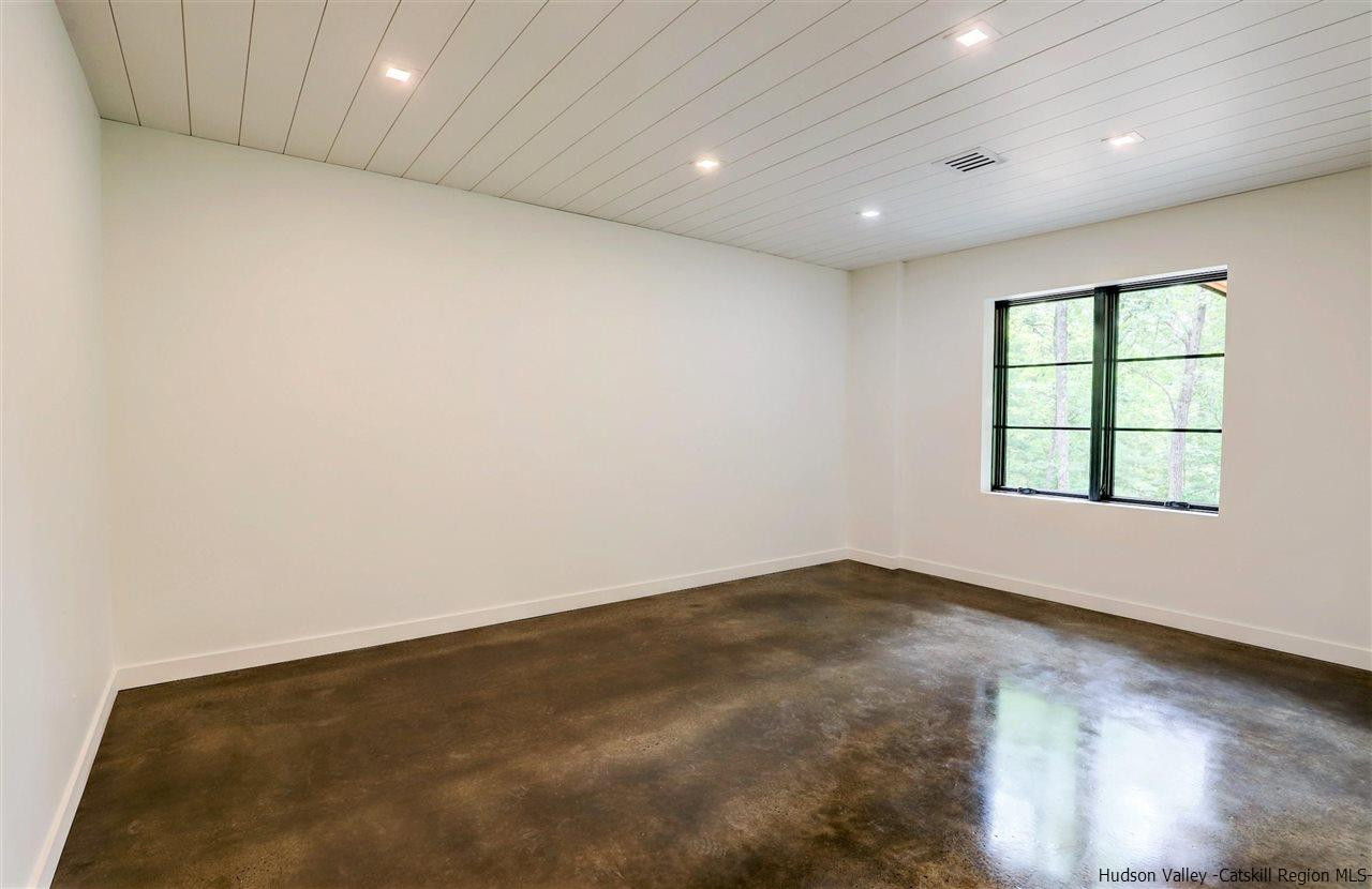 10 Hidden Mountain Stone Ridge, NY 12484 - Photo 22 of 35 an empty room with windows