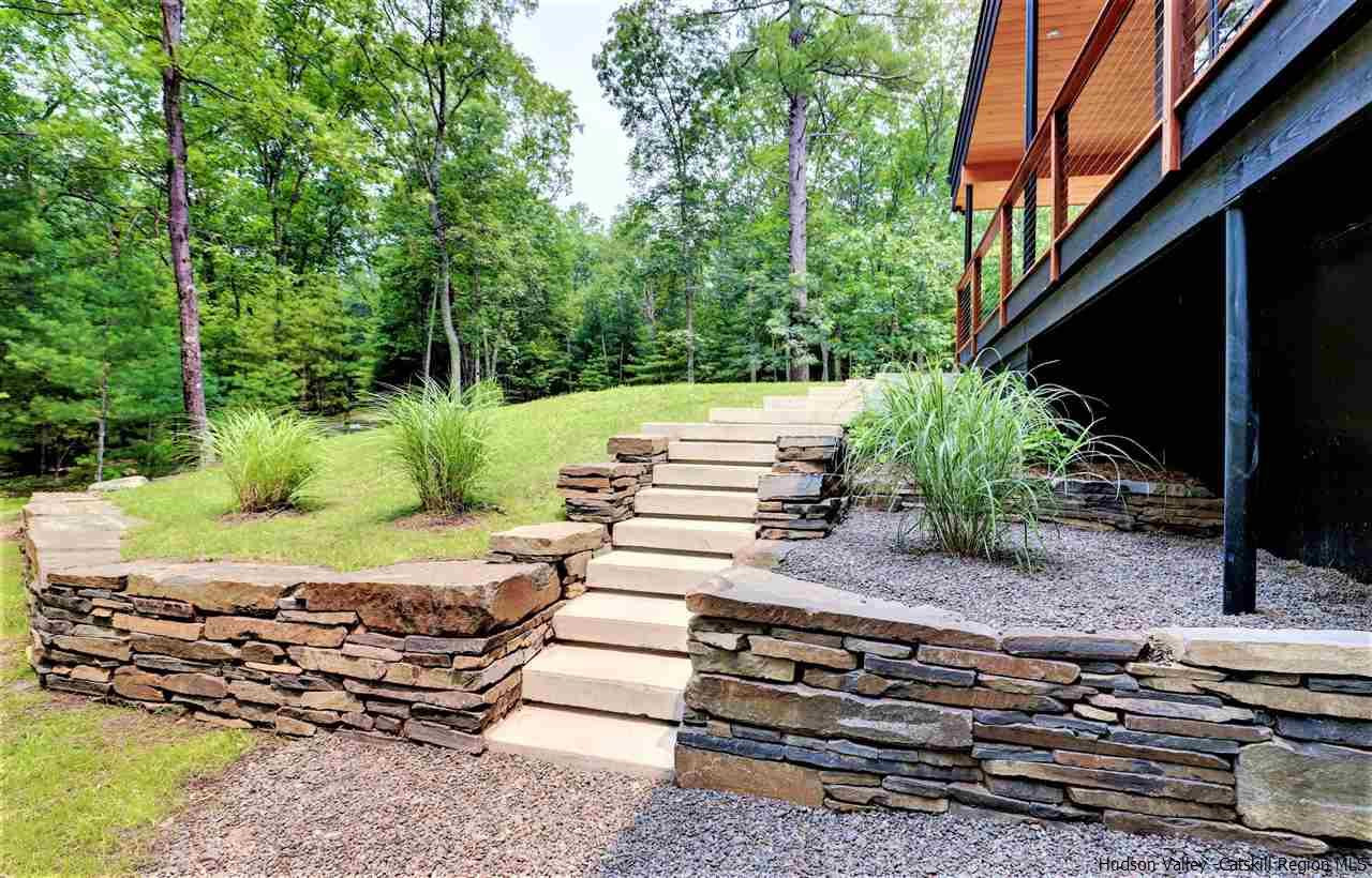 10 Hidden Mountain Stone Ridge, NY 12484 - Photo 25 of 35 a view of a backyard with chairs and plants
