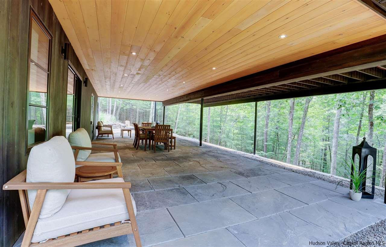 10 Hidden Mountain Stone Ridge, NY 12484 - Photo 30 of 35 a living room with furniture and large windows