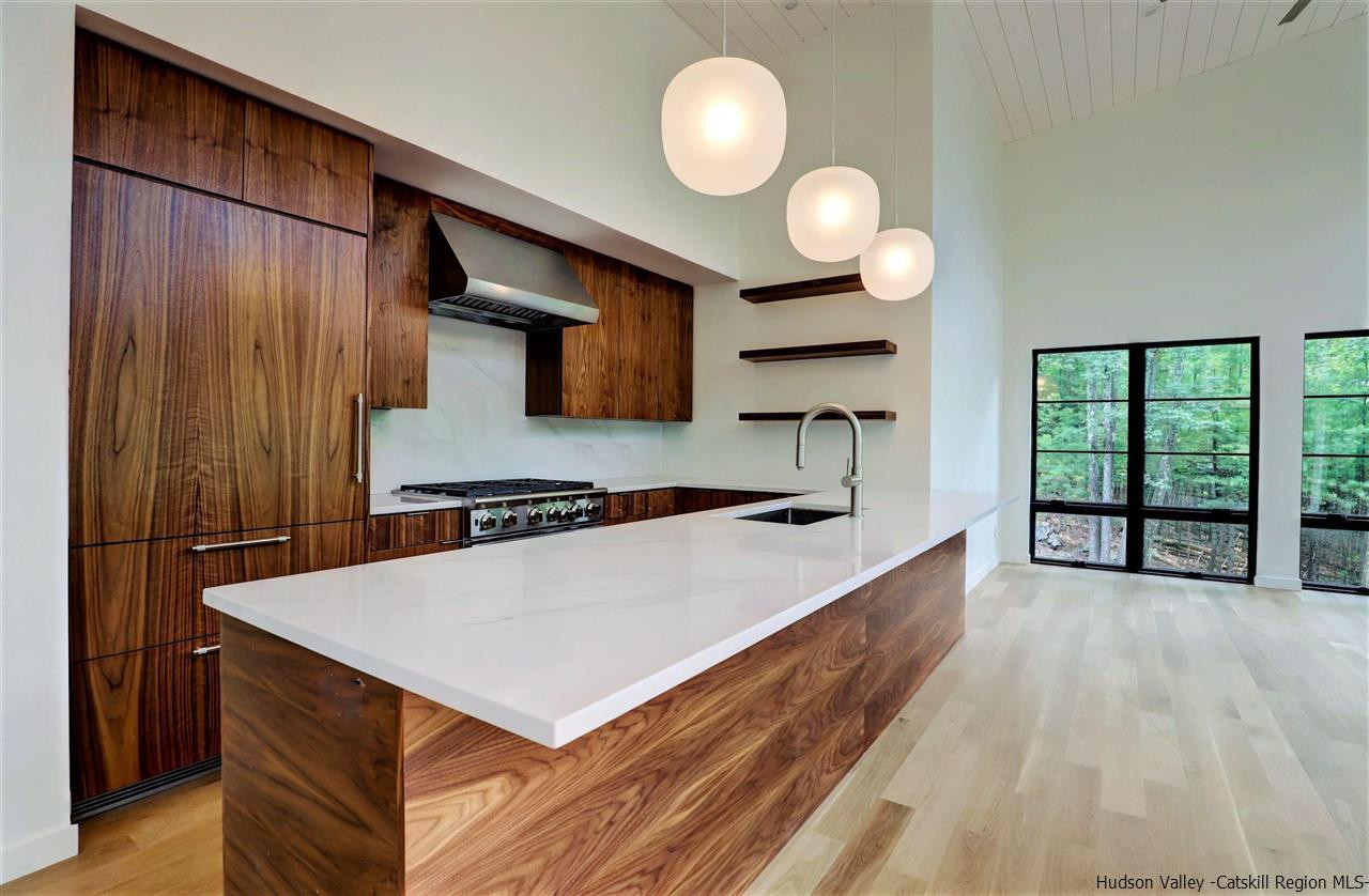 10 Hidden Mountain Stone Ridge, NY 12484 - Photo 6 of 35 a kitchen with wooden cabinets and a large window
