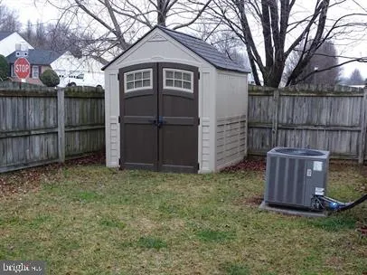 a view of a wooden fence