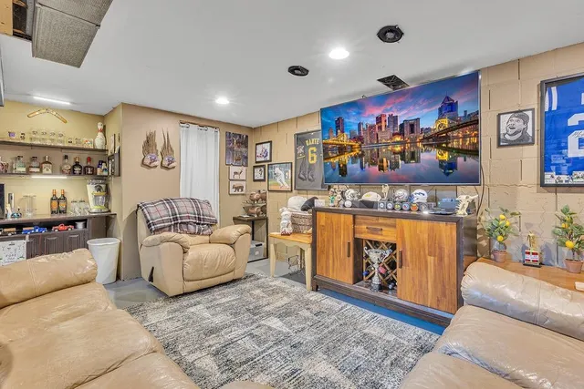 a living room with furniture and a couch