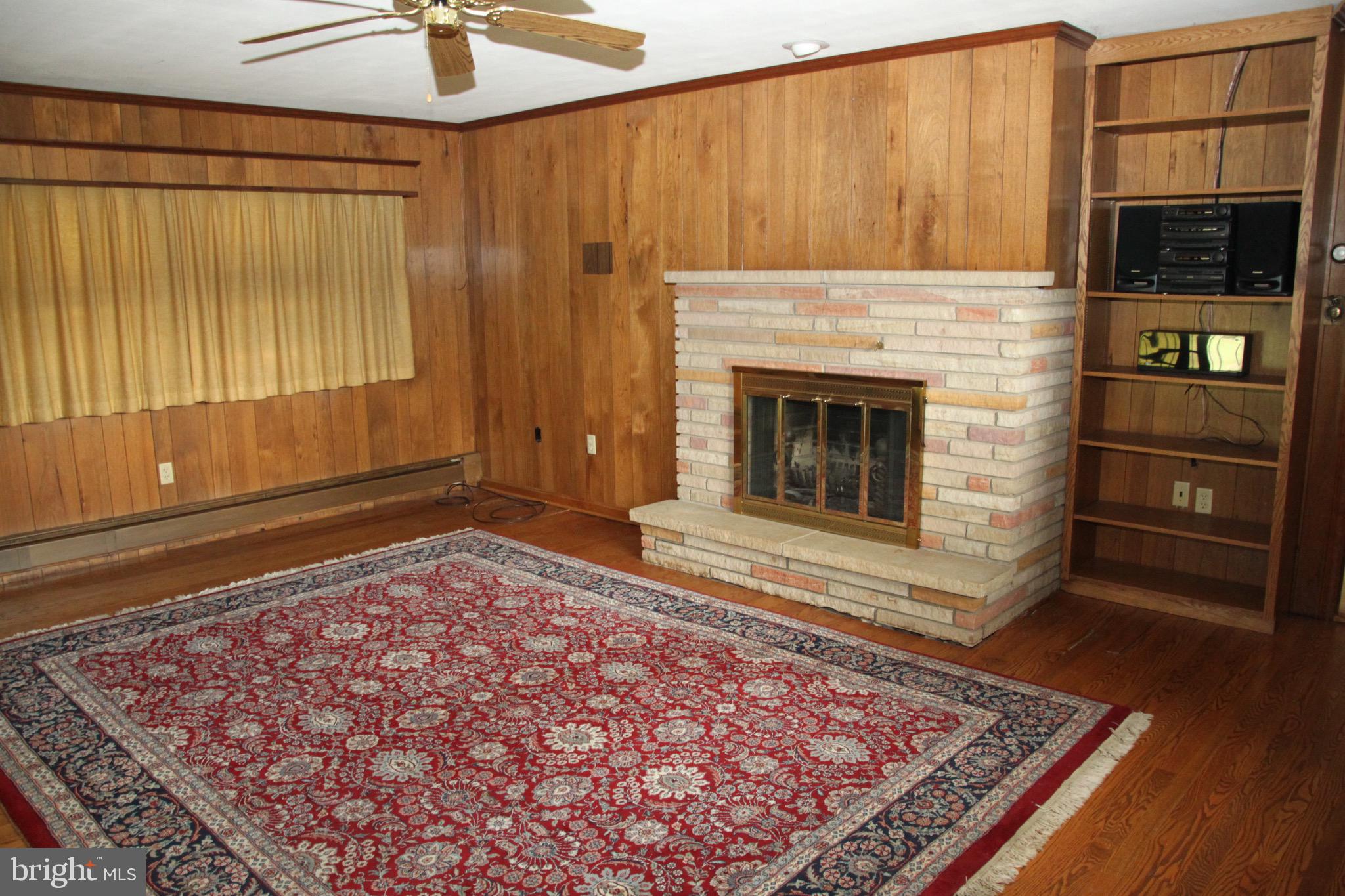 12233 Itnyre Road Smithsburg, MD 21783 - Photo 8 of 50 family room with wood burning fireplace