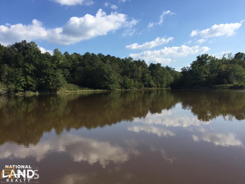 643 Rainey Road Temple, GA 30179 - Photo 1 of 1 a view of a lake in between the city and lake