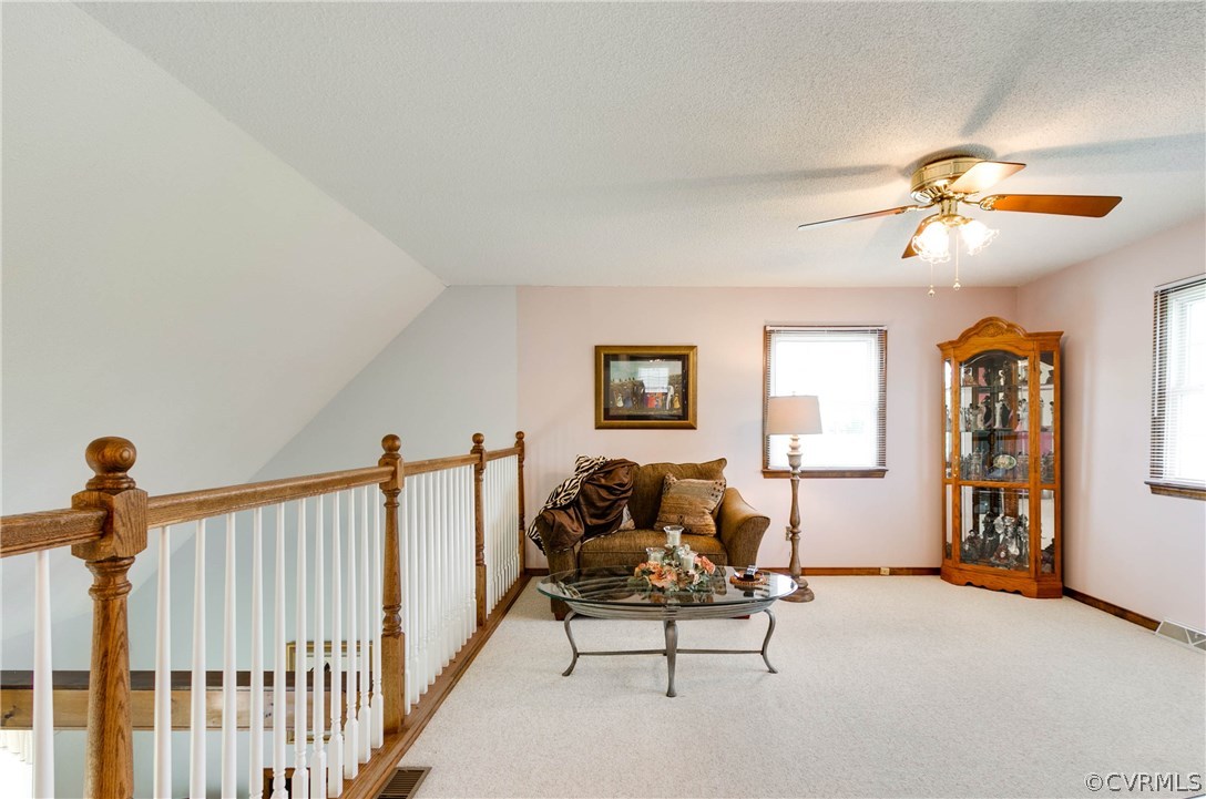 3008 Fielding Road Chester, VA 23831 - Photo 24 of 37 a living room with furniture and a window
