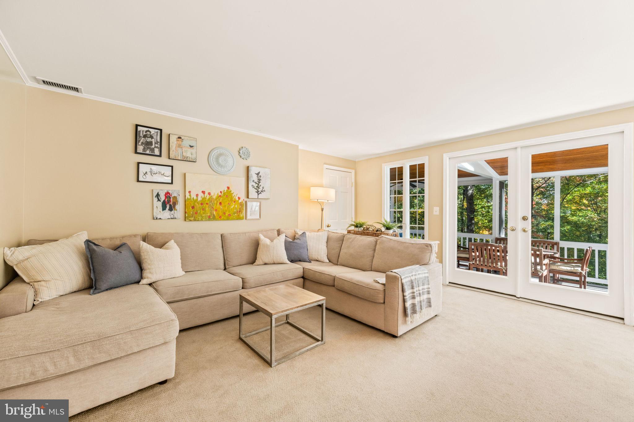 3203 Circle Hill Road Alexandria, VA 22305 - Photo 10 of 48 a living room with furniture and a large window