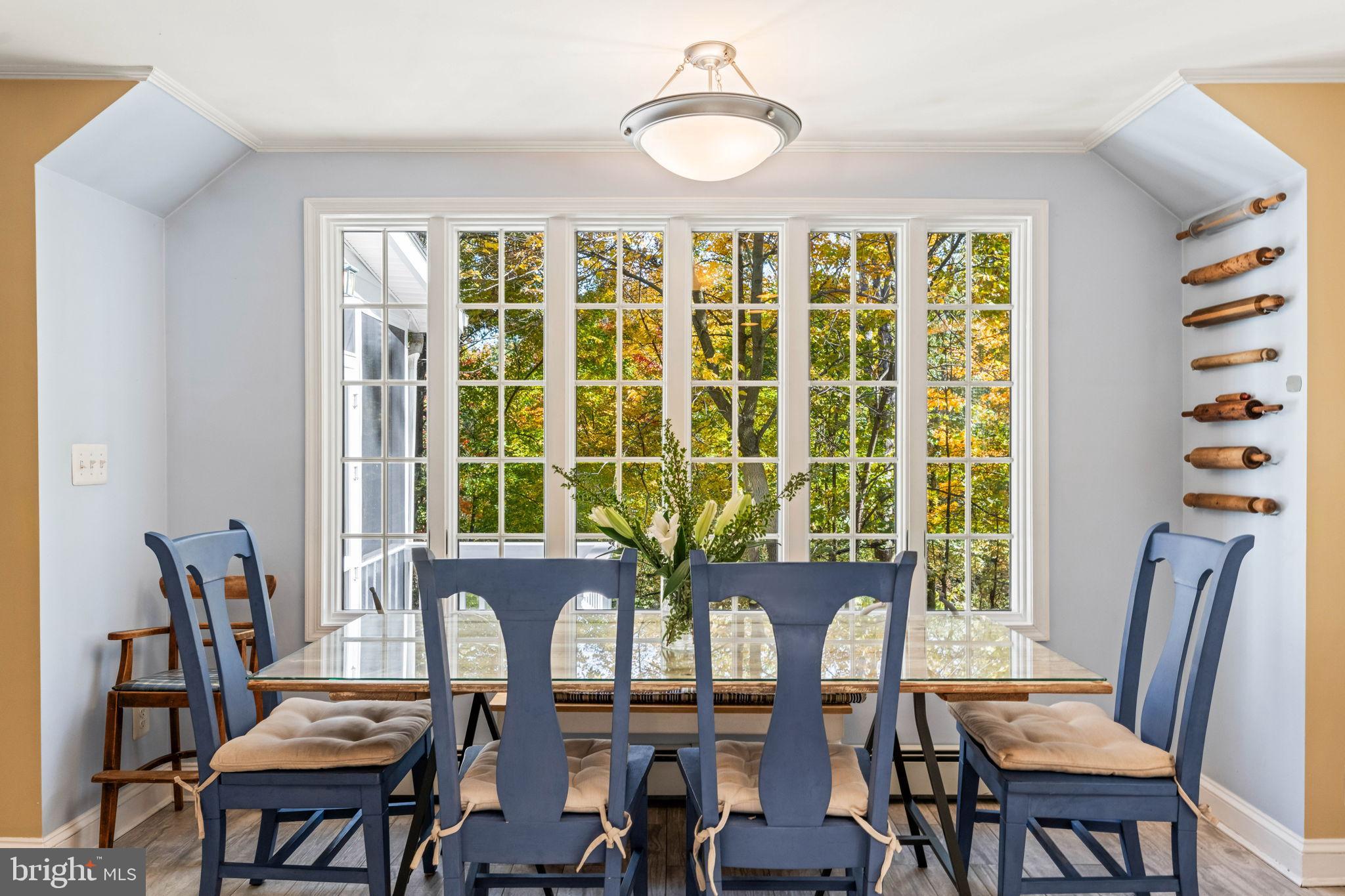 3203 Circle Hill Road Alexandria, VA 22305 - Photo 16 of 48 a view of a dining room with furniture window and wooden floor