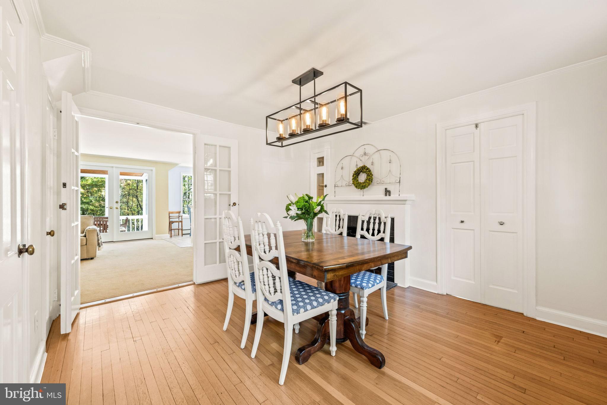 3203 Circle Hill Road Alexandria, VA 22305 - Photo 20 of 48 a view of a dining room with furniture and wooden floor