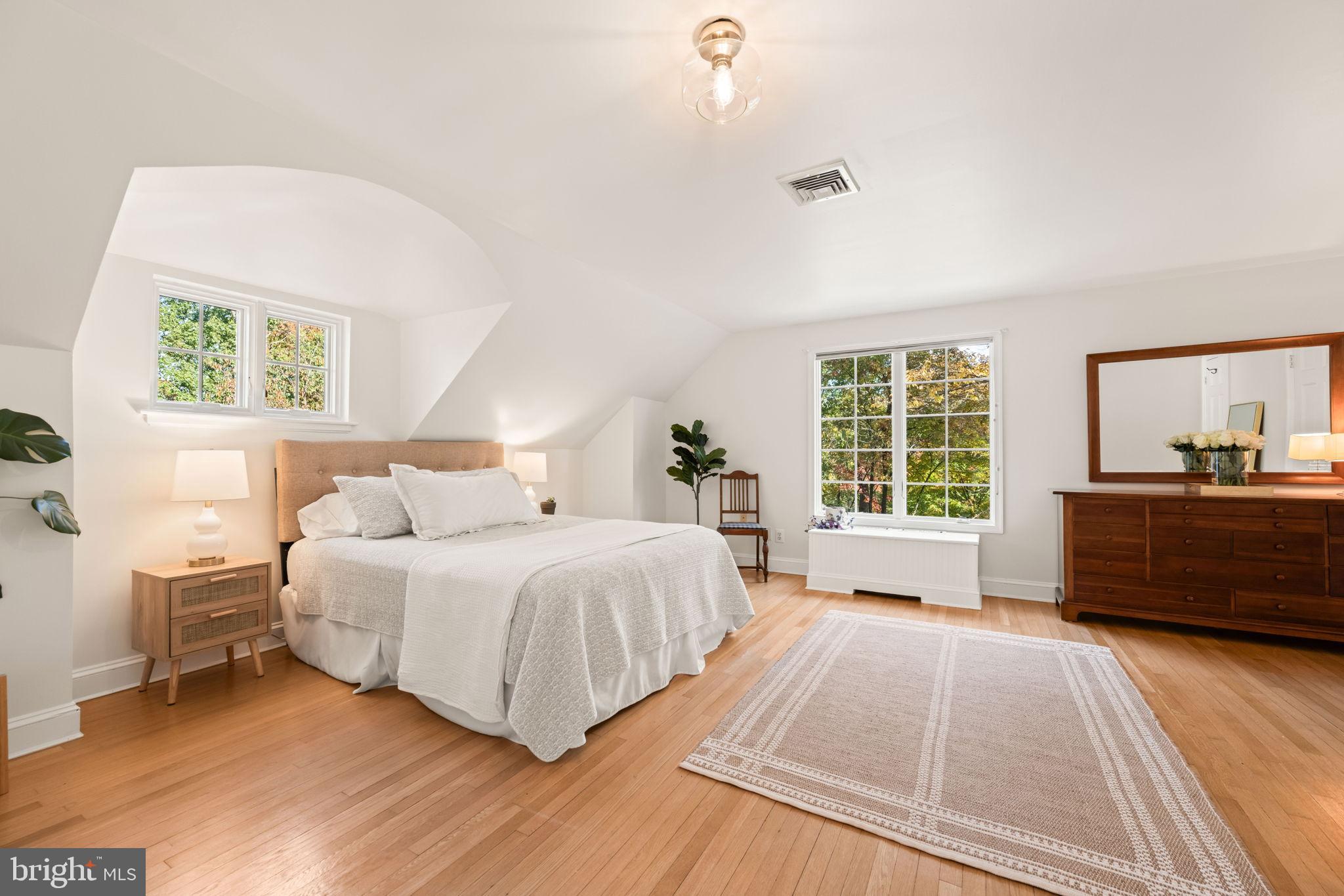 3203 Circle Hill Road Alexandria, VA 22305 - Photo 23 of 48 a bedroom with a bed and a large window