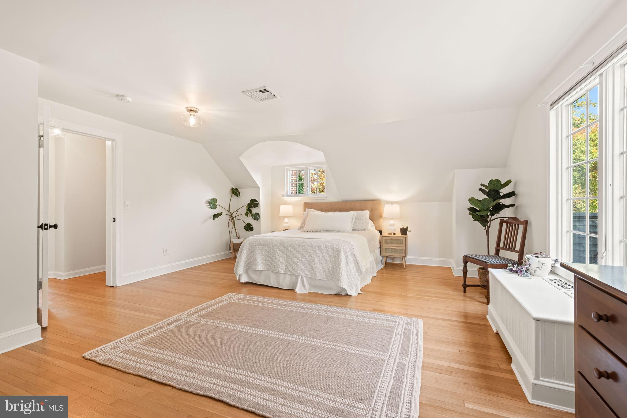 3203 Circle Hill Road Alexandria, VA 22305 - Photo 24 of 48 a spacious bedroom with a bed and a large window