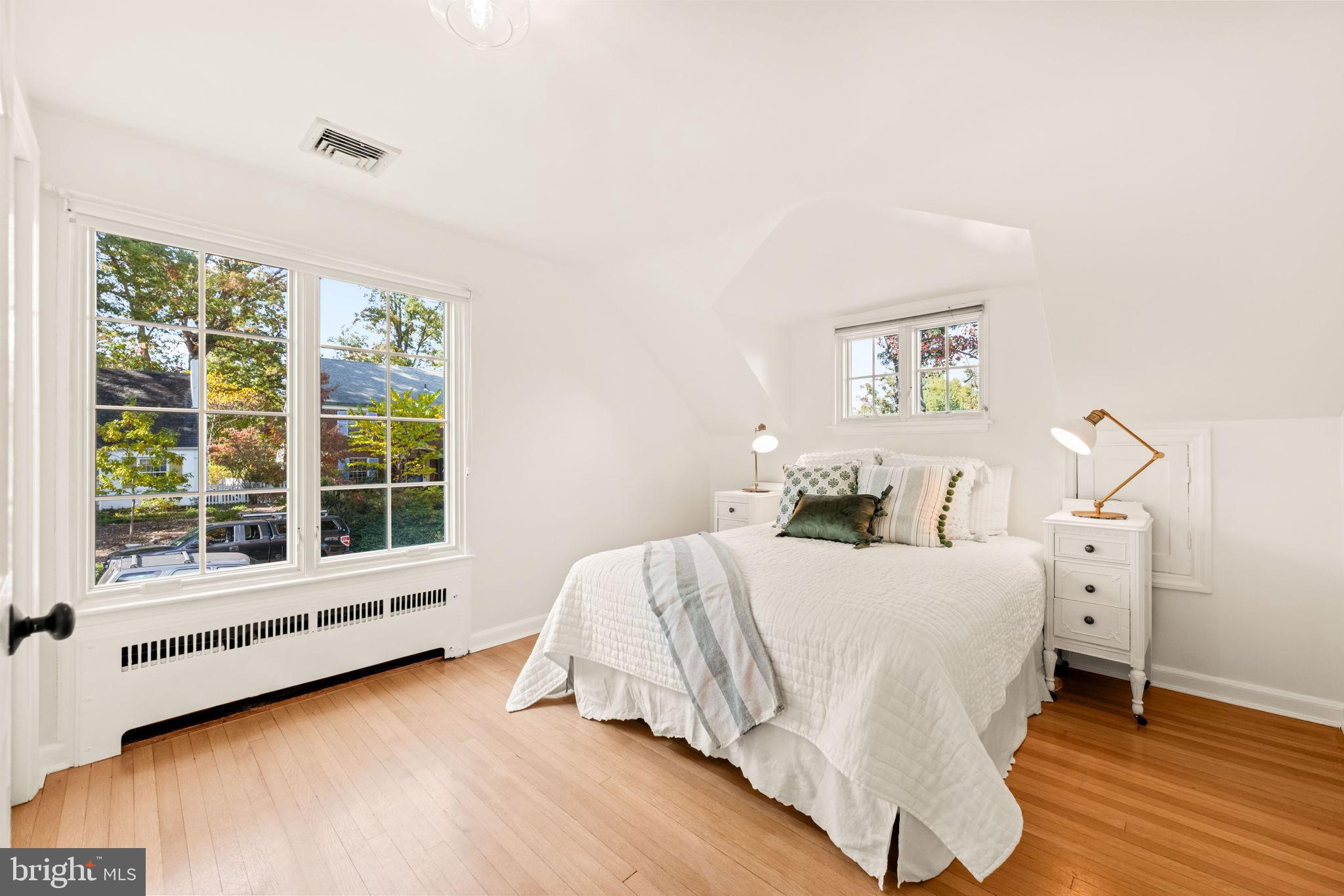 3203 Circle Hill Road Alexandria, VA 22305 - Photo 27 of 48 a bedroom with a bed and a large window