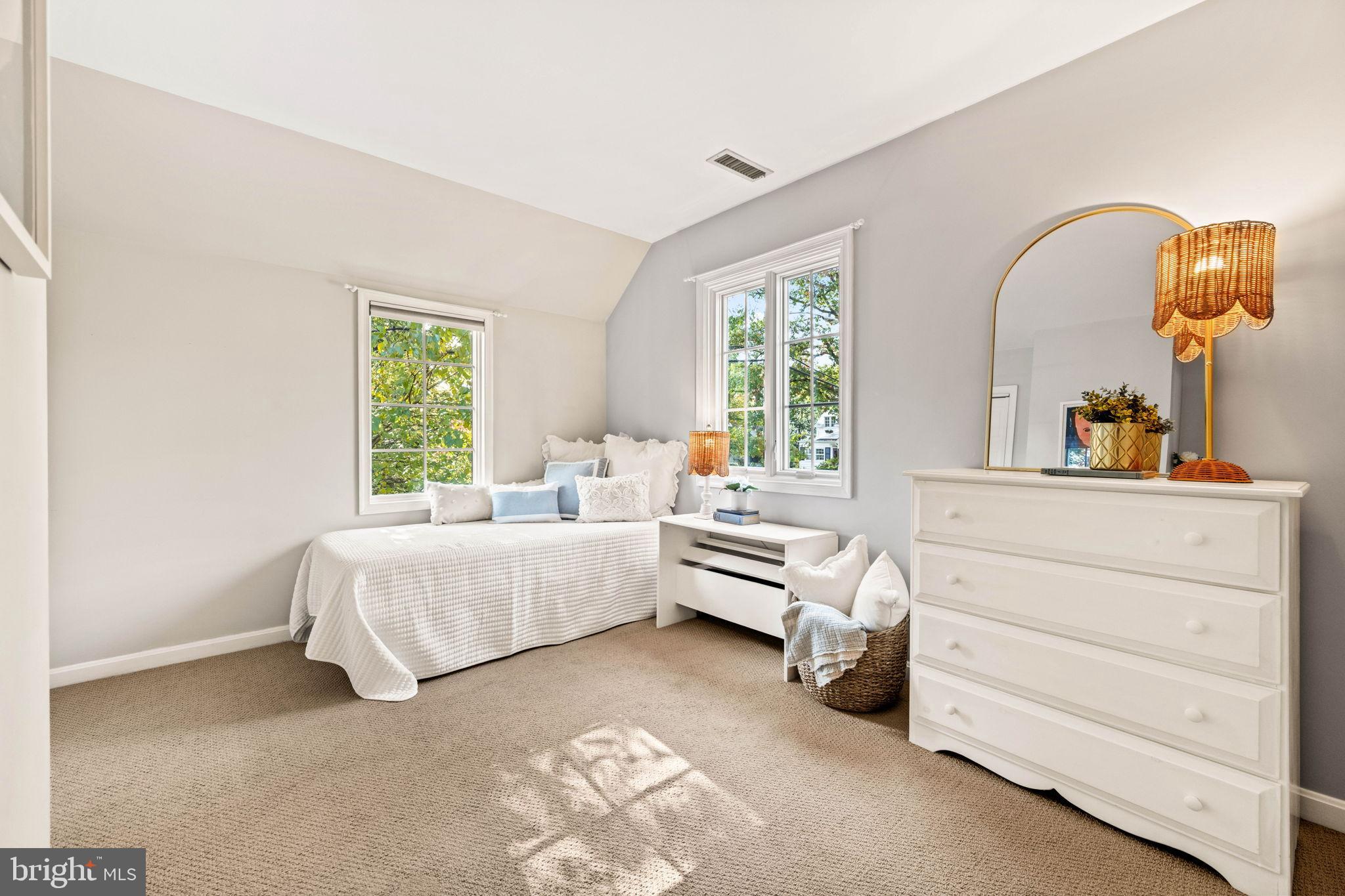 3203 Circle Hill Road Alexandria, VA 22305 - Photo 29 of 48 a room with a bed and a dresser