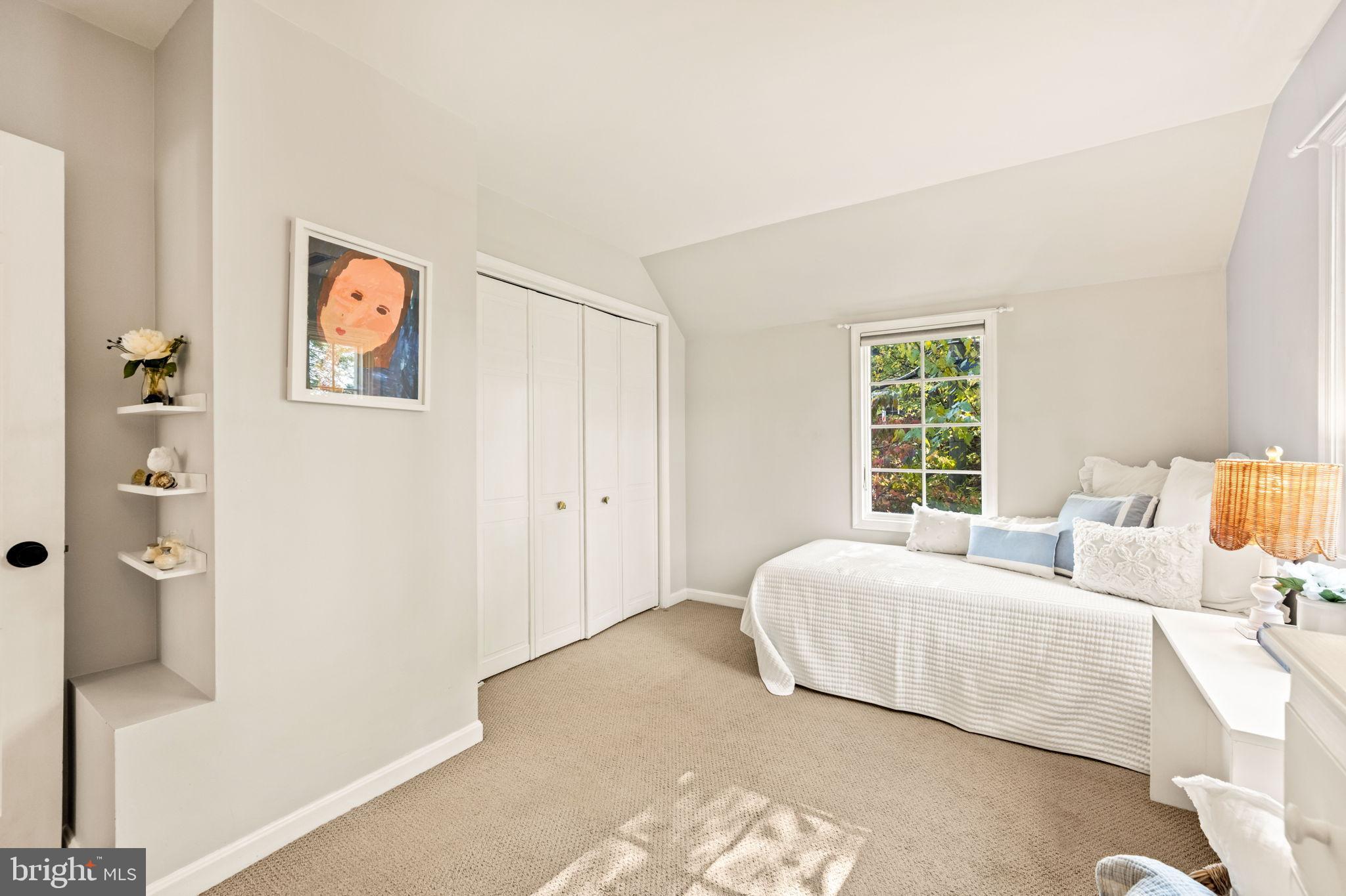 3203 Circle Hill Road Alexandria, VA 22305 - Photo 30 of 48 a bedroom with a bed and a window