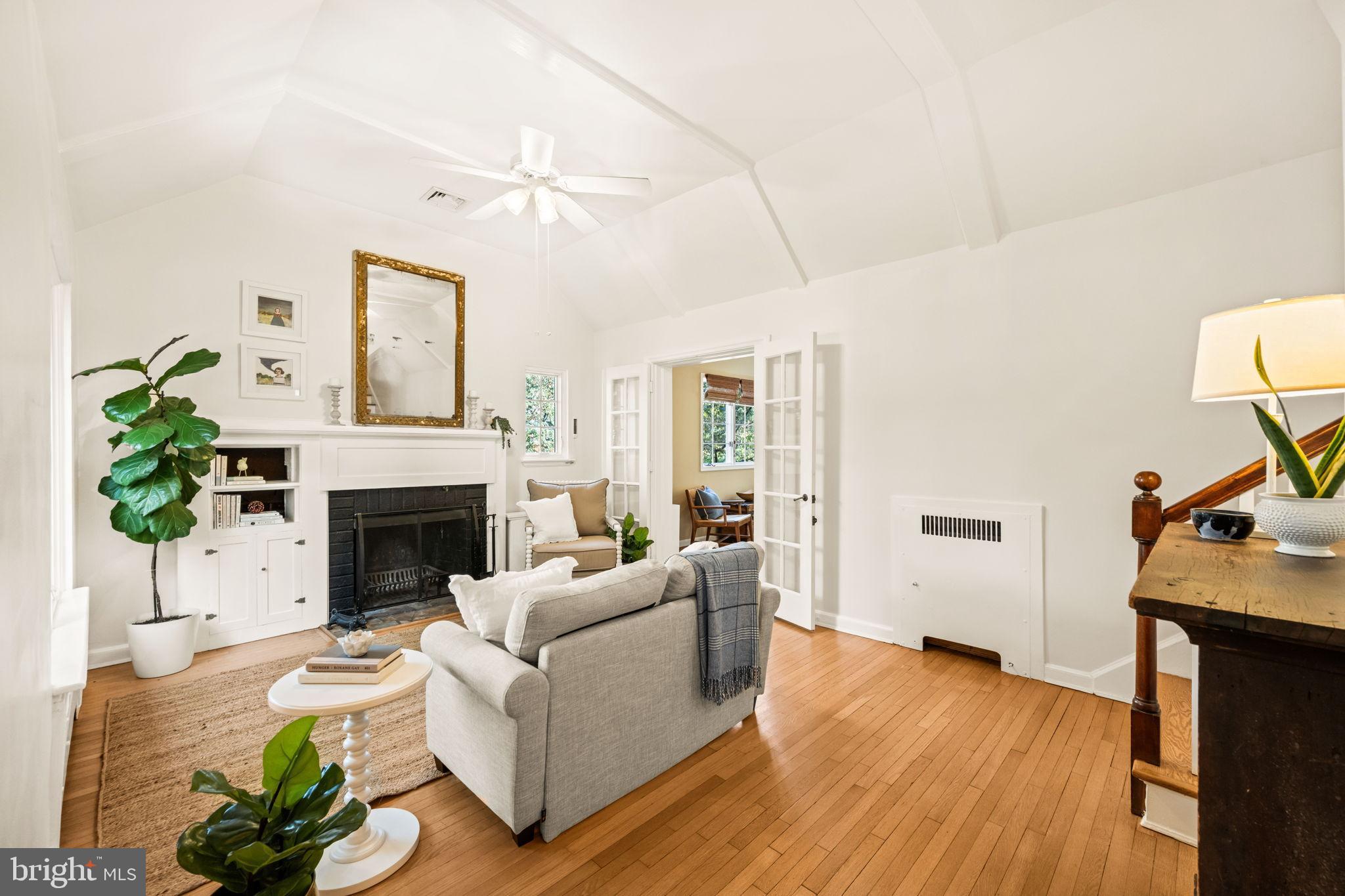 3203 Circle Hill Road Alexandria, VA 22305 - Photo 5 of 48 a living room with furniture and a fireplace