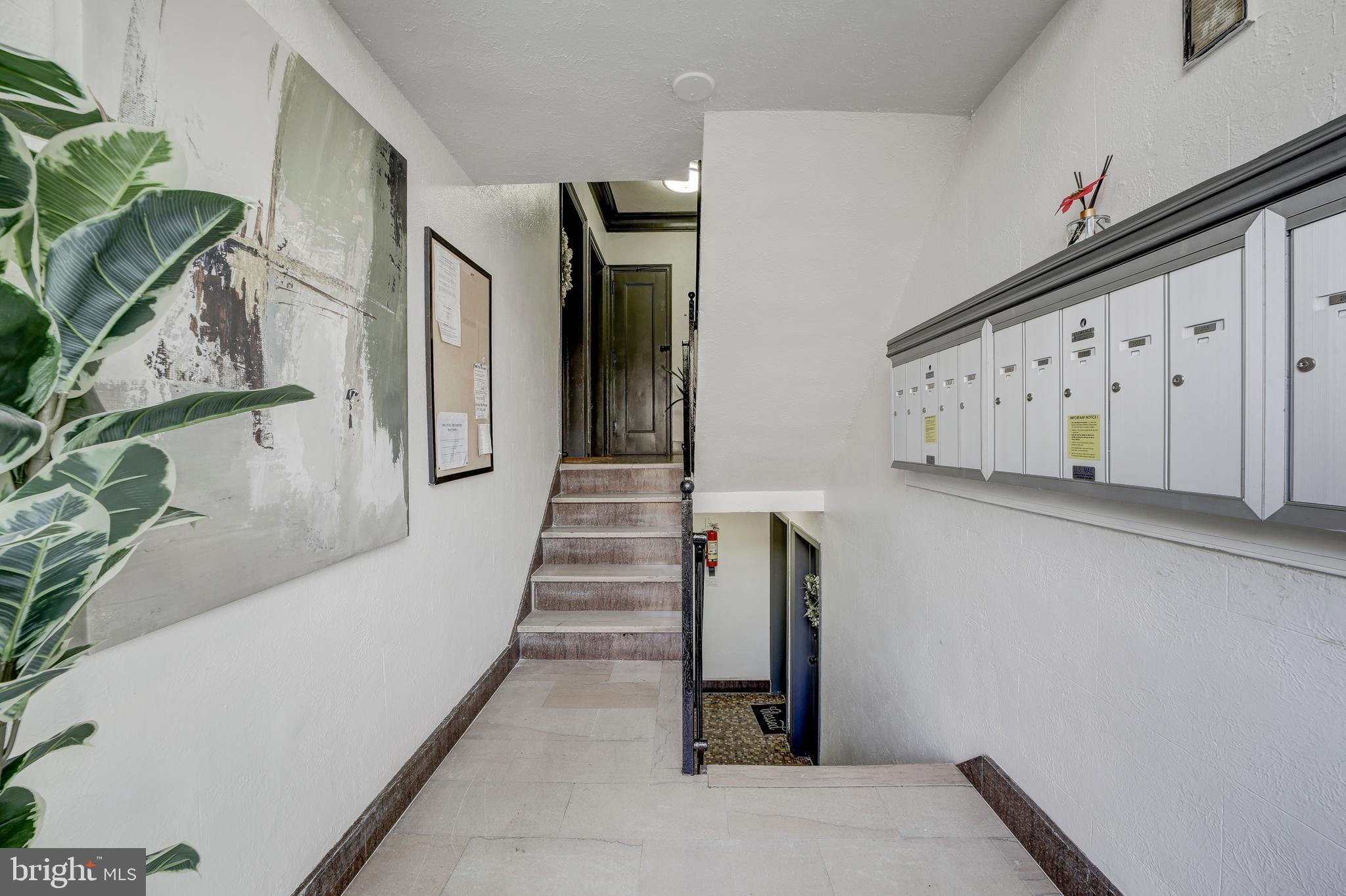 1404 Tuckerman Street Northwest, Unit 1 Washington, DC 20011 - Photo 17 of 18 a view of a hallway with staircase