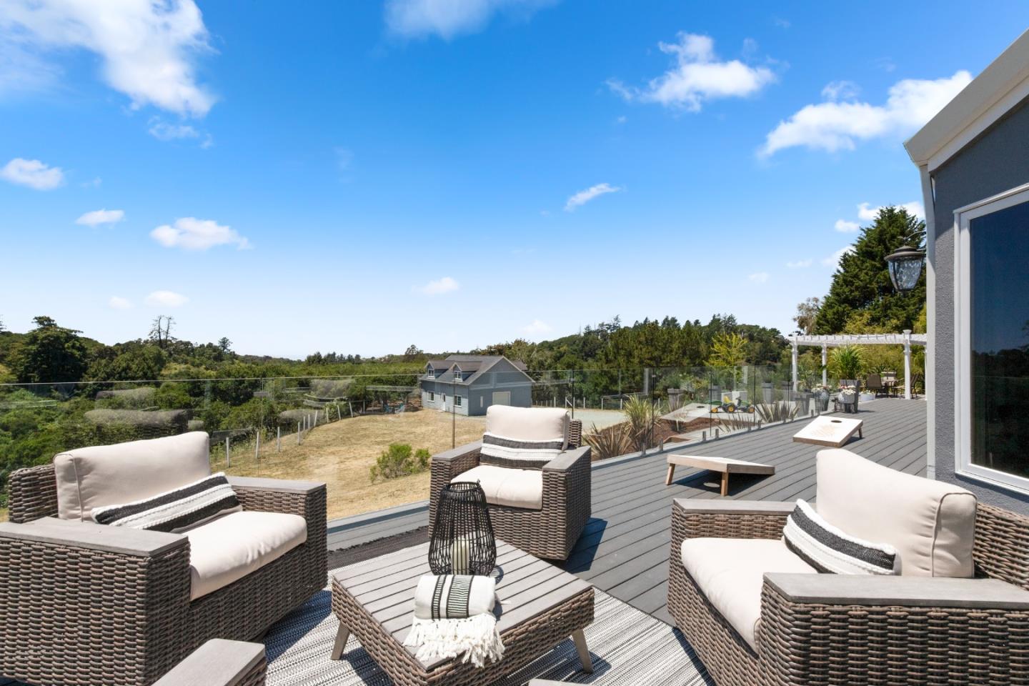 772 Aptos Ridge Circle Watsonville, CA 95076 - Photo 22 of 62 a view of a roof deck with couches and sky view